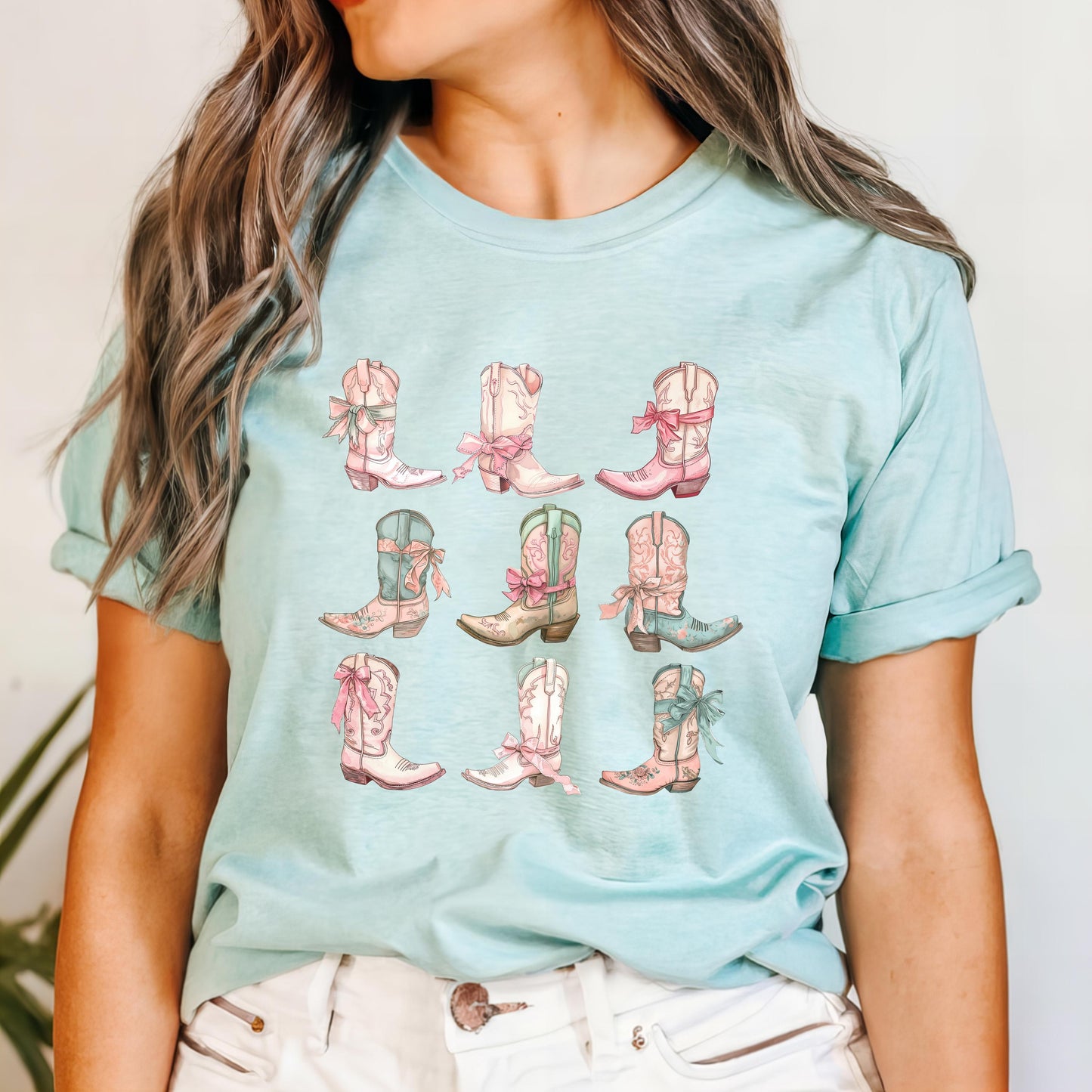 Rustic Cowgirl Graphic Tee: Western Boots & Bow Design for Country Music Lovers and Rodeo Enthusiasts