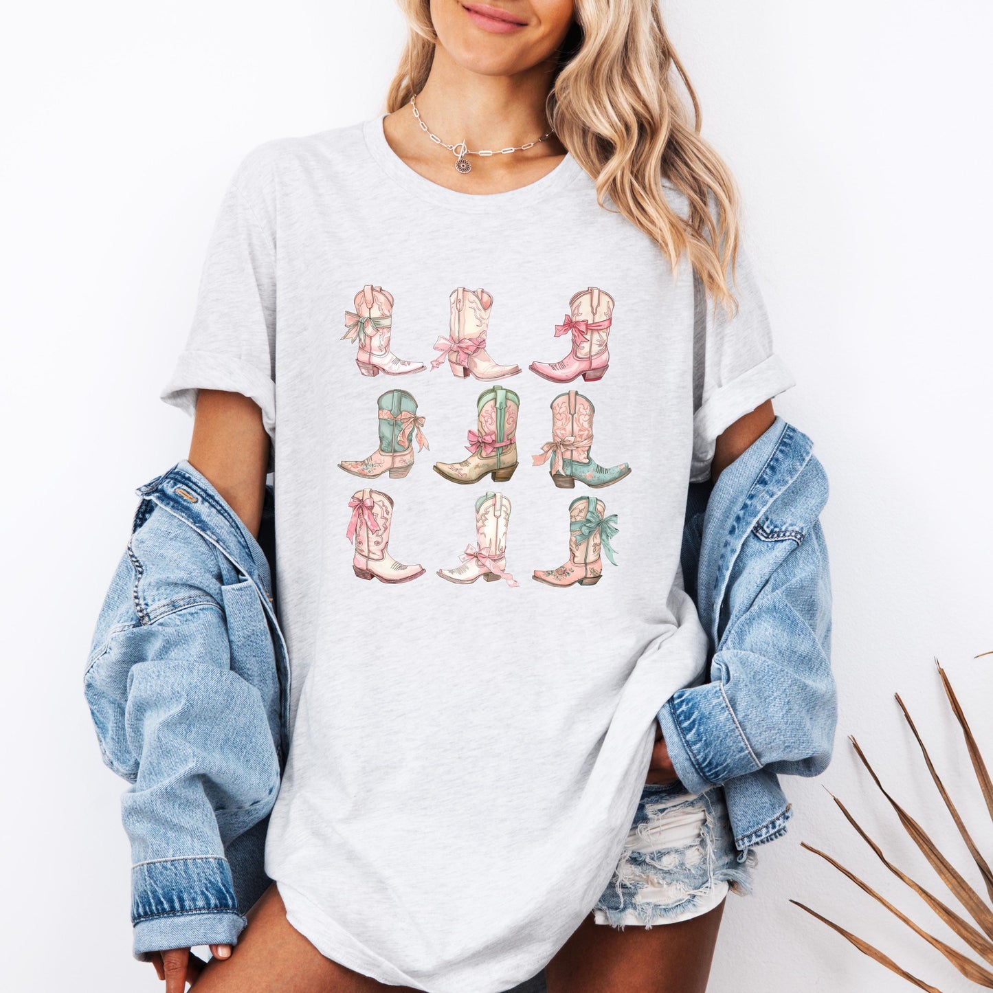 Rustic Cowgirl Graphic Tee: Western Boots & Bow Design for Country Music Lovers and Rodeo Enthusiasts